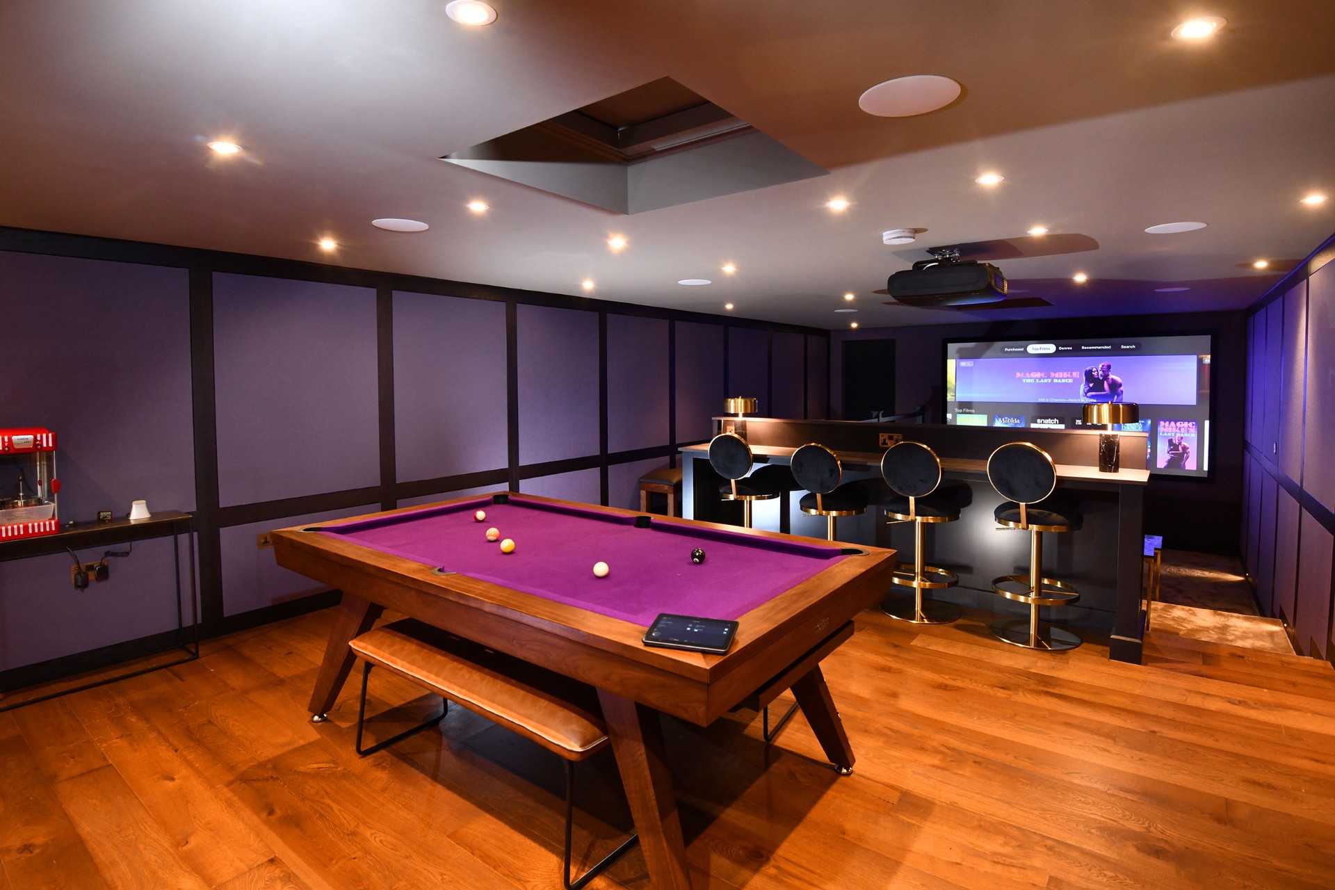 luxury home cinema with bar and pool table